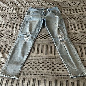 Ripped white wash skinny jeans